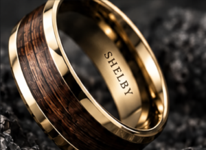 Gold-tone wood-inlay ring with crisp Shelby engraving on its inner band